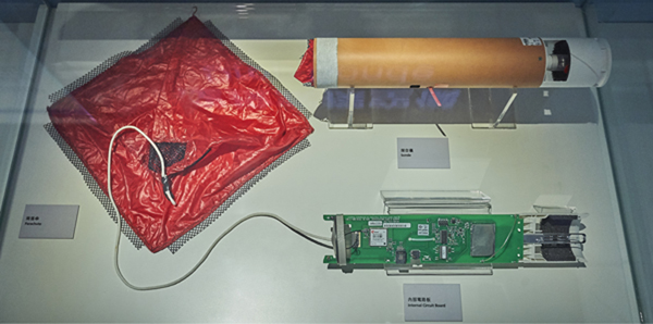 A dropsonde, dropped from an aircraft to collect meteorological data, such as air pressure, temperature and humidity.