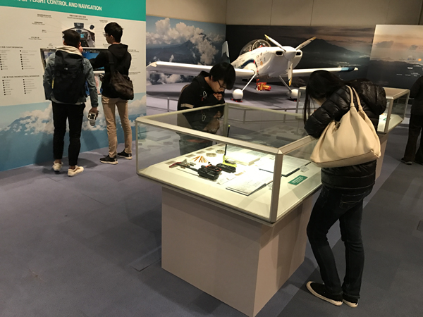 The exhibition showcases exhibits including the flight logbooks of Hank, the flight instruments and tools used to build the aircraft
